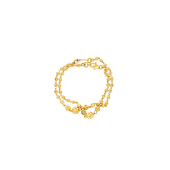 An image of the 22K gold bracelet with varying sized gold balls from Virani Jewelers.