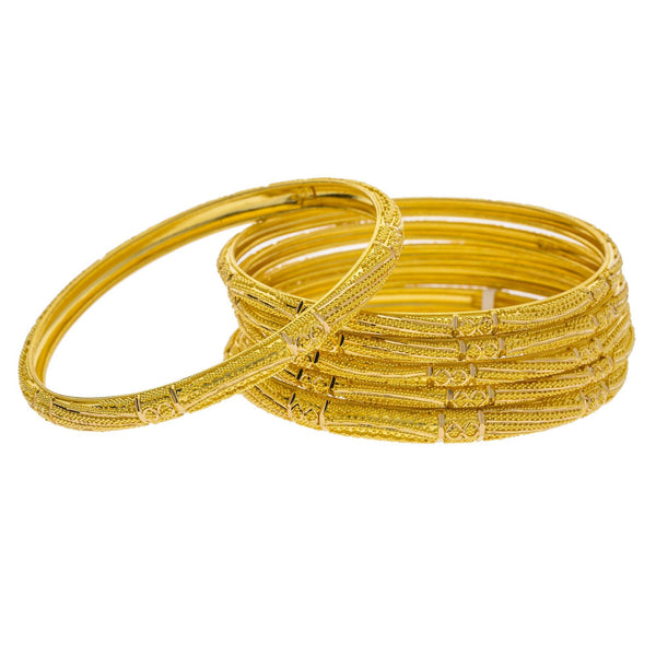 22K Yellow Gold Domed Bangles Set of 6 W/ Gold Strips & Gold Ball Filling - Virani Jewelers | 


Layer on the luxury with this beautiful set of six 22K yellow gold domed bangles from Virani J...