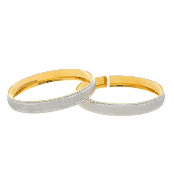 22K Yellow Gold Feminine Bangles Set of Two, 51.4 grams - Virani Jewelers | 


Spoil your lady love with a bangle that's designed exclusively for her. The basic design of th...