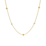 An image of a white and yellow 22K gold necklace with bead accents from Virani Jewelers. | Find the perfect way to accent your ensemble with this 22K gold necklace from Virani Jewelers!

F...