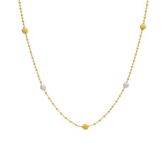 An image of a white and yellow 22K gold necklace with bead accents from Virani Jewelers.