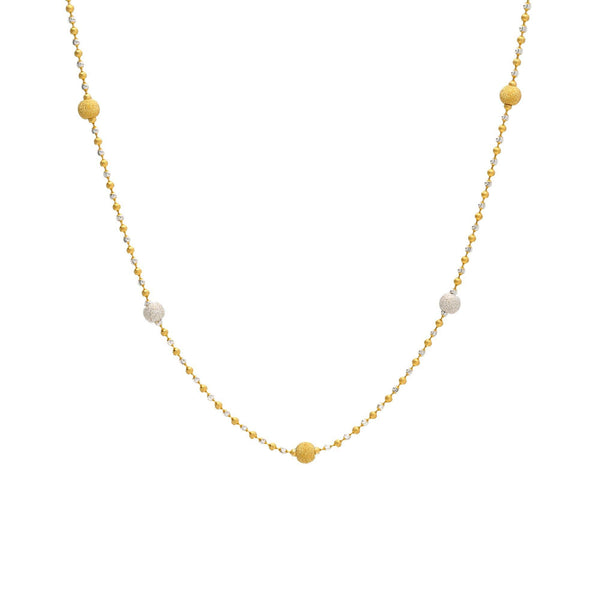 An image of a white and yellow 22K gold necklace with bead accents from Virani Jewelers. | Find the perfect way to accent your ensemble with this 22K gold necklace from Virani Jewelers!

F...