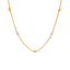An image of a 22K gold necklace from Virani Jewelers with yellow and white gold beads spread throughout the wheat link chain.