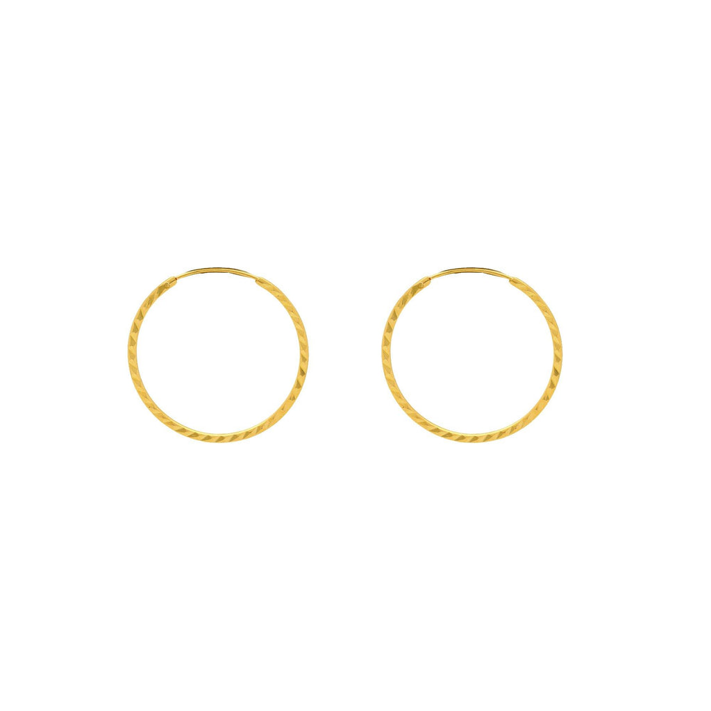 An image of 22K gold hoop earrings from Virani Jewelers. | Enhance your natural beauty with these gorgeous minimalist hoops from Virani Jewelers!

Made with...