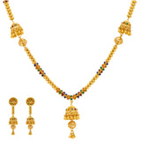 An image of the 22K gold necklace set with colorful clusters from Virani Jewelers. | Add bold and bright designs to your wardrobe with this gorgeous 22K gold necklace set from Virani...