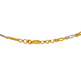 An image of the lobster claw clasp on the yellow and white 22K gold necklace from Virani Jewelers. | Show off your unique sense of style with this one-of-a-kind 22K gold necklace set from Virani Jew...