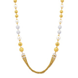 An image of the 22K gold necklace with white and yellow gold and uncut diamonds from Virani Jewelers. | Show off your glamorous side with this dazzling 22K gold necklace set from Virani Jewelers!

Made...