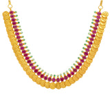 An image of the 22K gold necklace with ruby and emerald embellishments from Virani Jewelers. | Combine color and style with this festive 22K gold necklace set from Virani Jewelers!

Crafted wi...