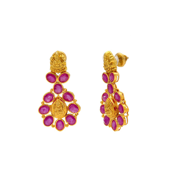 A close-up image showing the post of the Indian gold earrings with ruby embellishments from Virani Jewelers. | Celebrate your culture in style with a beautiful 22K gold necklace set from Virani Jewelers!

Des...