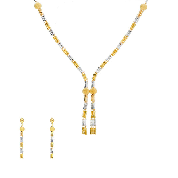 An image of a 22K gold jewelry set featuring a necklace and matching earrings crafted by Virani Jewelers | This 22K yellow and white gold set from Virani Jewelers is an exquisite way to complement any for...