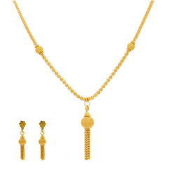 An image of the 22K gold tassel necklace set from Virani Jewelers.