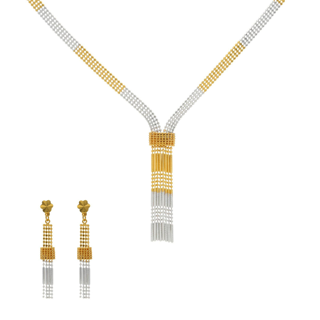22K Gold Stunning Singapore set w/ Earrings - Virani Jewelers | 


This 22K yellow gold necklace with earrings comes in an alluring ethnic design that will go we...