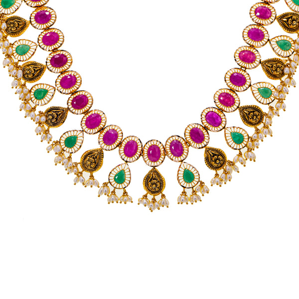 22K Yellow Gold, Gemstone, and Pearl Necklace (108.7gm) | 
Pair this 22k yellow gold, gemstone, and pearl necklace with your bridal or traditional gowns fo...