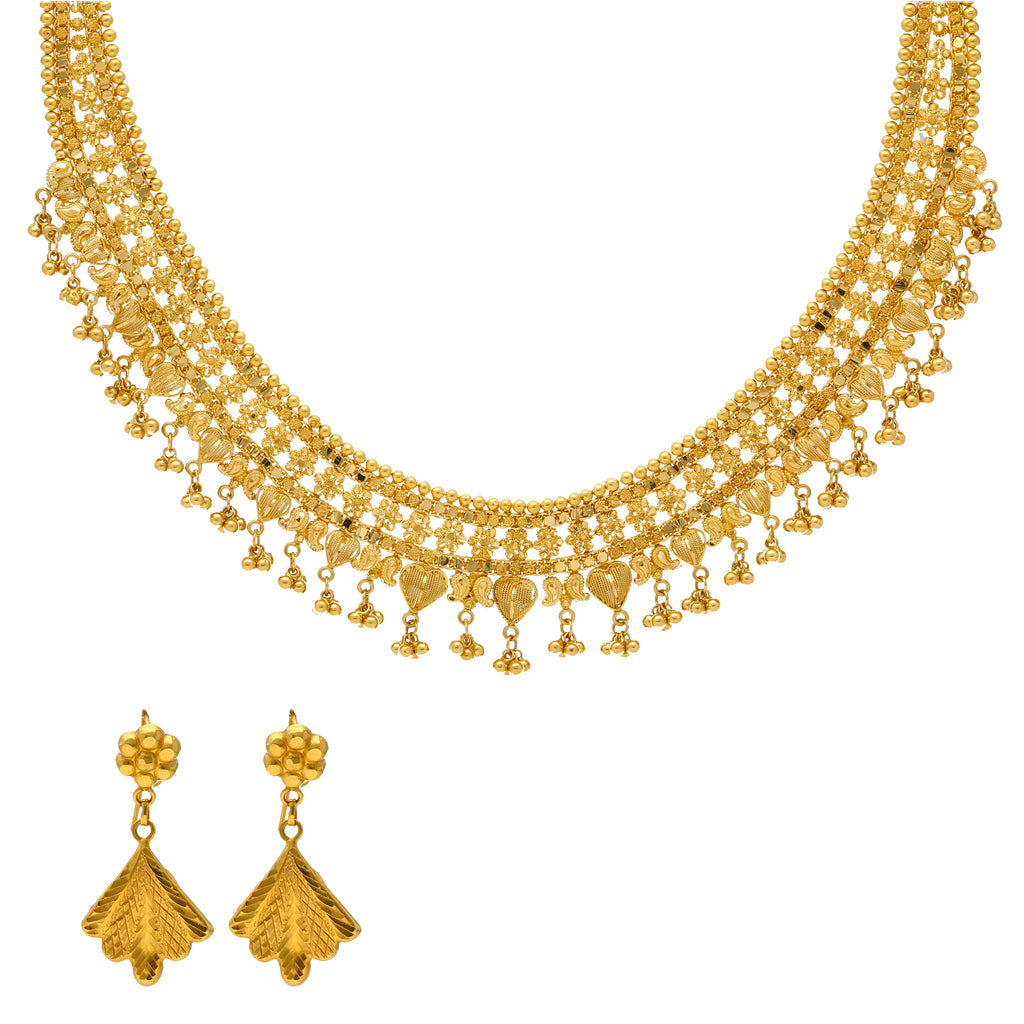 22K Yellow Gold Candra Jewelry Set | 
Our 22K Yellow Gold Candra Necklace Set is demure, classy, and chic. This ultra feminine 22k gol...