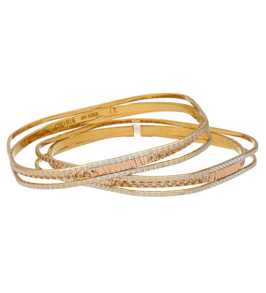 22K Multi-Tone Gold Layered Bangle Set (50.4gm) | 
These elegant 22k Indian gold bangles radiate luxury and elegance. The layered design of 22k yel...