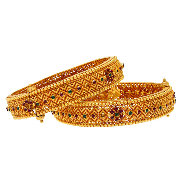 22K Yellow Gold, Emerald & Ruby Bangle Set (65gm) | 


This set of 22k Indian gold bangles have a beautiful assortment of colorful gemstones that cre...