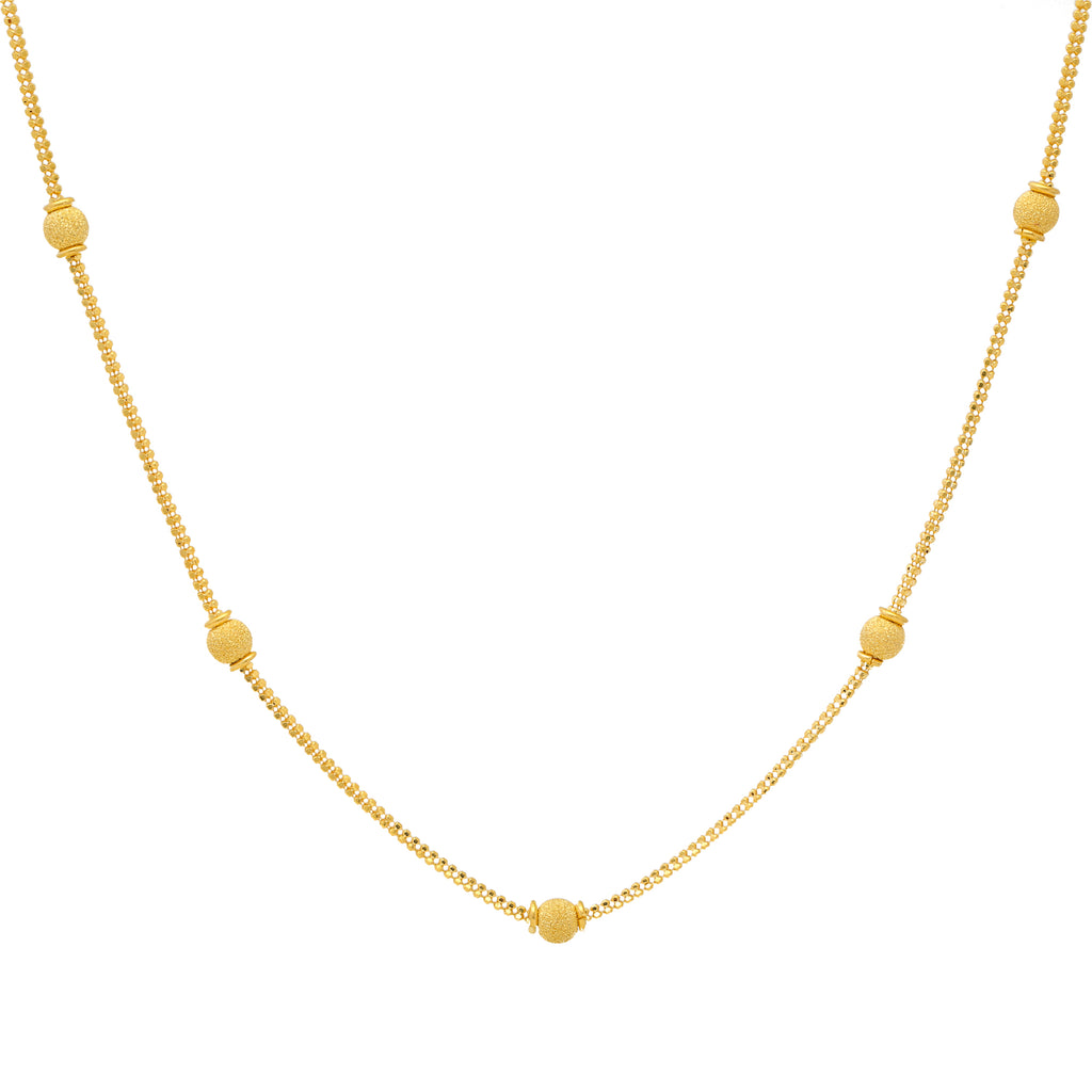 22K Yellow Gold 1mm Beaded Chain (13.6gm) | 
The elegant beading added to this minimal 22k yellow gold chain brings a lady-like allure to the...
