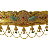 A close-up shot of the gem-studded peacocks and gold rope chandeliers that decorate the 22K waist belt from Virani Jewelers. | Add movement and luxury to your most festive looks with Vaddanam waist belts that will transform ...