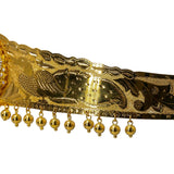 A close-up shot of the peacock and dangling gold balls that are featured on a 22K waist belt from Virani Jewelers. | Add movement and luxury to your most festive looks with Vaddanam waist belts that will transform ...