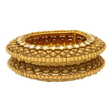 22K Yellow Gold Charita Bangle Set (125.1gm) | 
This unique pair of 22k yellow gold bangles have traditional kundan stones incorporated into the...