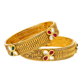 22K Yellow Gold Jasmit Bangle Set (55.4gm) | 
This charming set of 22k yellow gold bangles have a beautiful design encrusted with kundan stone...