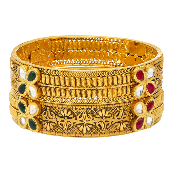22K Yellow Gold Jasmit Bangle Set (55.4gm) | 
This charming set of 22k yellow gold bangles have a beautiful design encrusted with kundan stone...