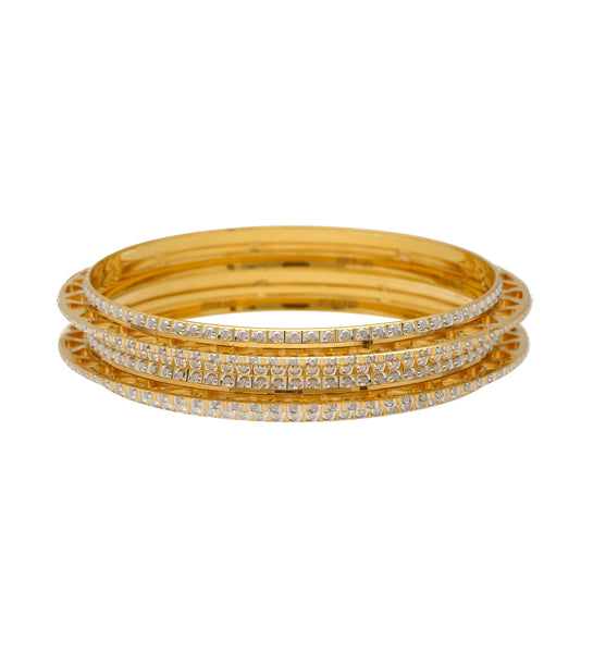 22K Yellow & White Gold Bangle Set (58.9gm) | 
These glimmering Indian gold bangles made of 22k yellow and white gold will light up your wrist ...