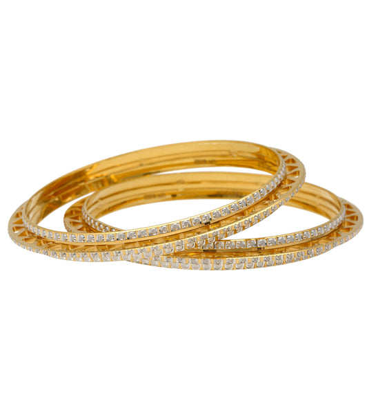 22K Yellow & White Gold Bangle Set (58.9gm) | 
These glimmering Indian gold bangles made of 22k yellow and white gold will light up your wrist ...