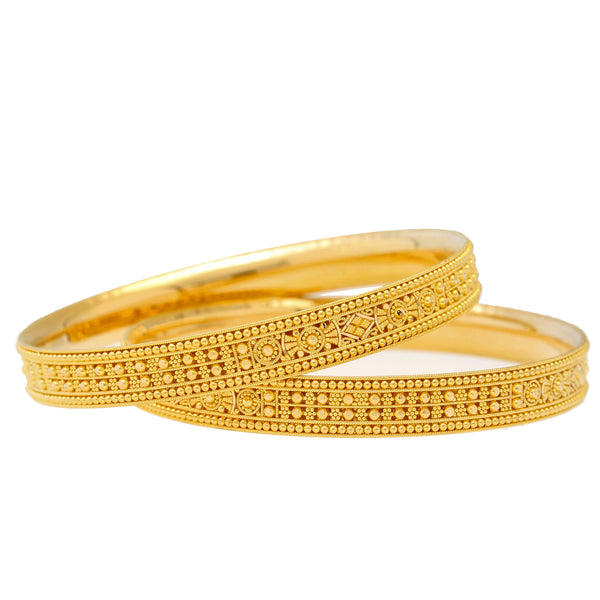 22K Yellow Gold Filigree Bangle Set of 6 (93.9gm) | 
This beautiful set of 22 carat gold Indian bangles will light up the wrists of any women who wea...