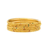 22K Yellow Gold & Enamel Bangle Set of 6 (92.7gm) | 
The bright enamel details used alongside the filigree design of these 22k gold Indian bangles ad...