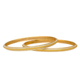 22K Yellow Gold Filigree Bangle Set of 6 (64.7gm) | 
Add this stylish of 22k yellow and white gold Indian bangles to any formal, evening, or traditio...