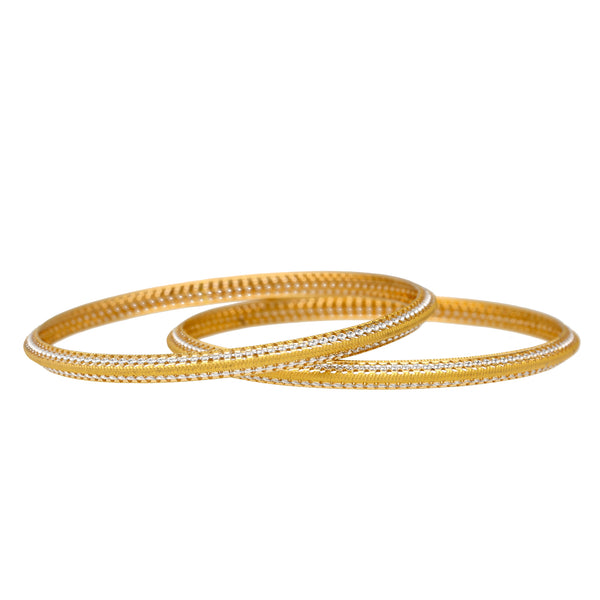 22K Yellow Gold Filigree Bangle Set of 6 (64.7gm) | 
Add this stylish of 22k yellow and white gold Indian bangles to any formal, evening, or traditio...