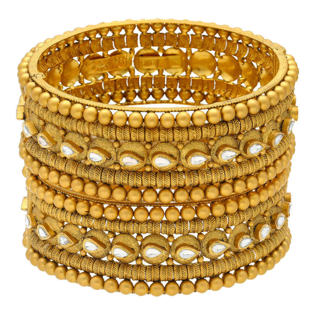 22K Yellow Gold Bimala Bangle Set (84.5gm) | 
These radiant 22k yellow gold and kundan stone bangles will be the perfect addition to any brida...
