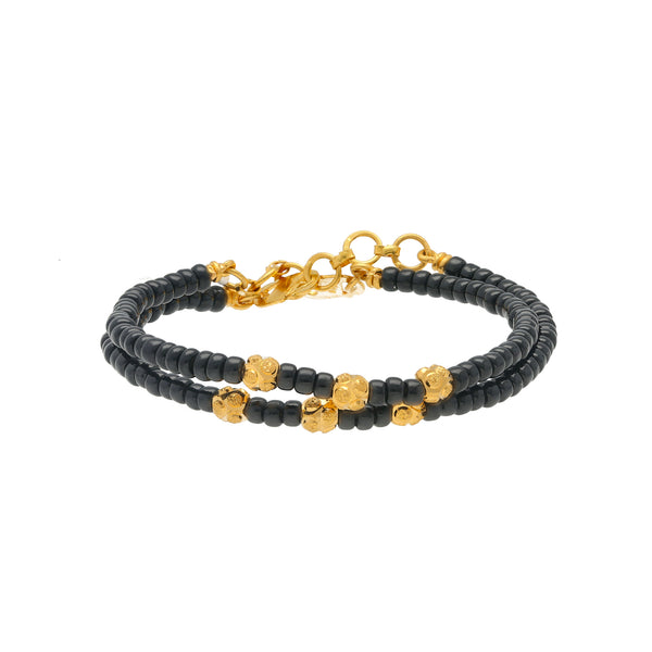22K Yellow Gold & Black Bead Bracelet for Kids (8.8gm) | 
What better way to protect the energy of your little one than with this cultural set of 22k yell...
