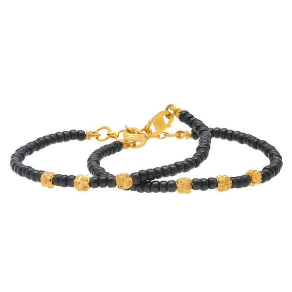 22K Yellow Gold & Black Bead Bracelet for Kids (8.8gm) | 
What better way to protect the energy of your little one than with this cultural set of 22k yell...