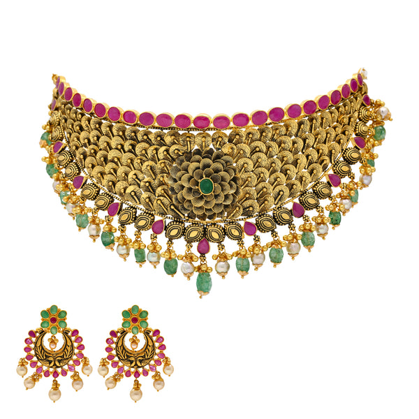 22K Antique Gold Choker Set with Gemstones & Pearls (92.2 grams) | 
The elaborate floral design made of antique gold on this 22k choker and chandbali earring set ar...