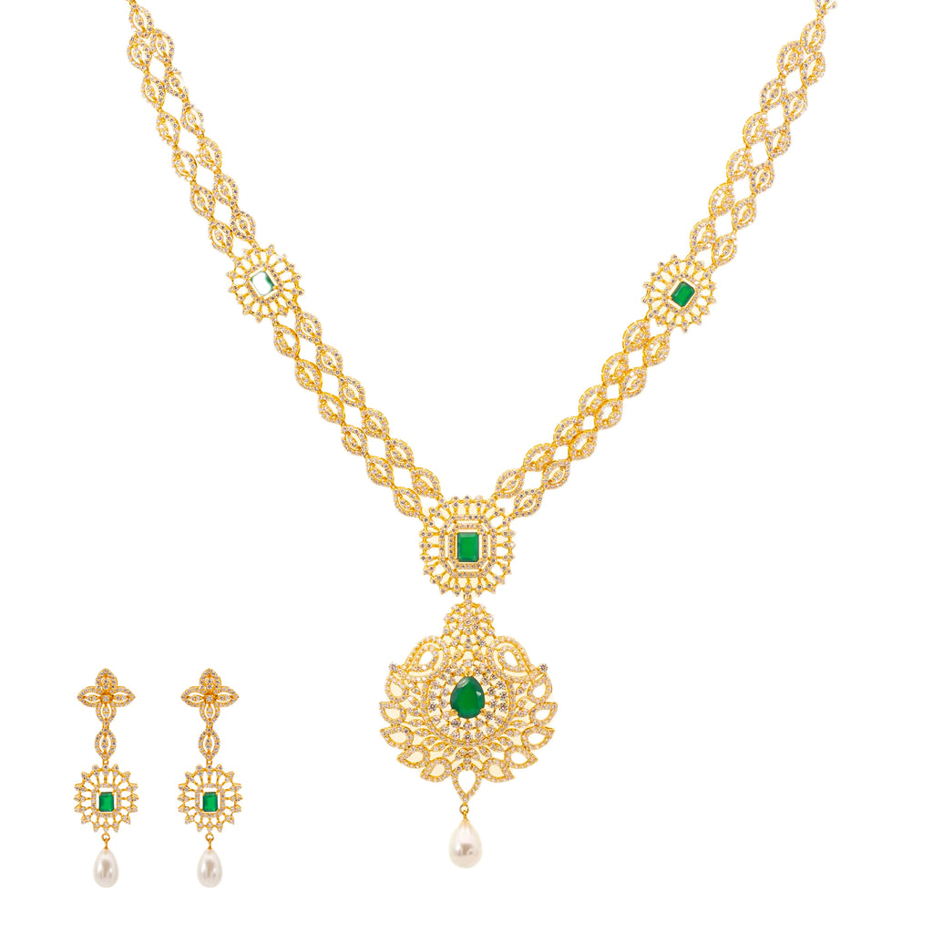 Jaya Jewelry Set w/ 22K Yellow Gold & Emeralds (77.8gm) | 
Our Jaya Jewelry set is simply breathtaking. The 22k yellow gold design is decorated with a stun...