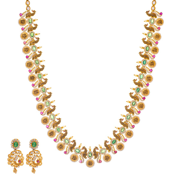 22K Gold & Gemstone Long Kasu Necklace Set (85.5gm) | 
This extravagant 22k yellow gold and gemstone necklace set features exquisite elements and detai...