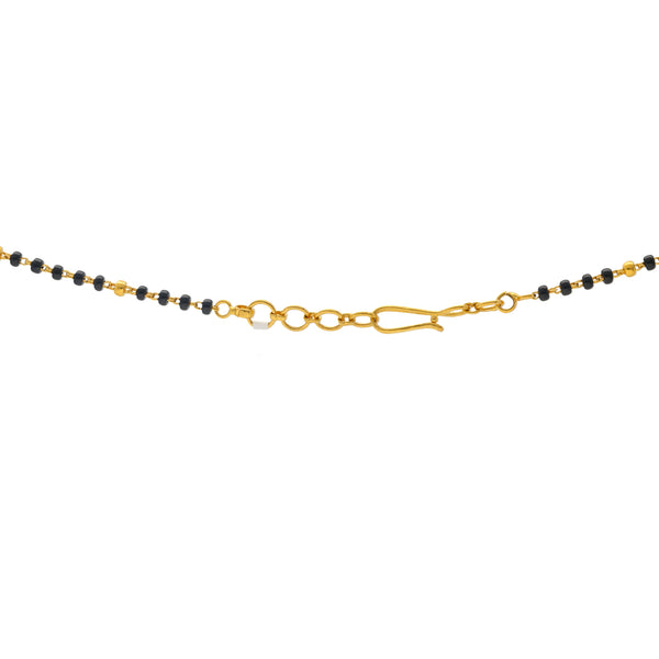 22K Yellow Gold Mangalsutra Necklace (12.3gm) | 
Add this 22k yellow gold and black bead mangalsutra necklace to your post matrimonial jewelry co...
