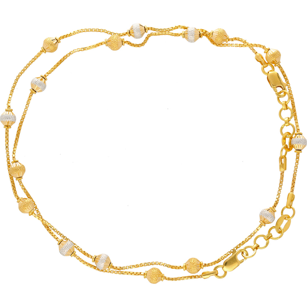 22K Yellow & White Gold Ball Bead Anklet Set (14gm) | 
This dainty and adorable 22k gold ankle bracelet set from Virani Jewelers will add a subtle laye...