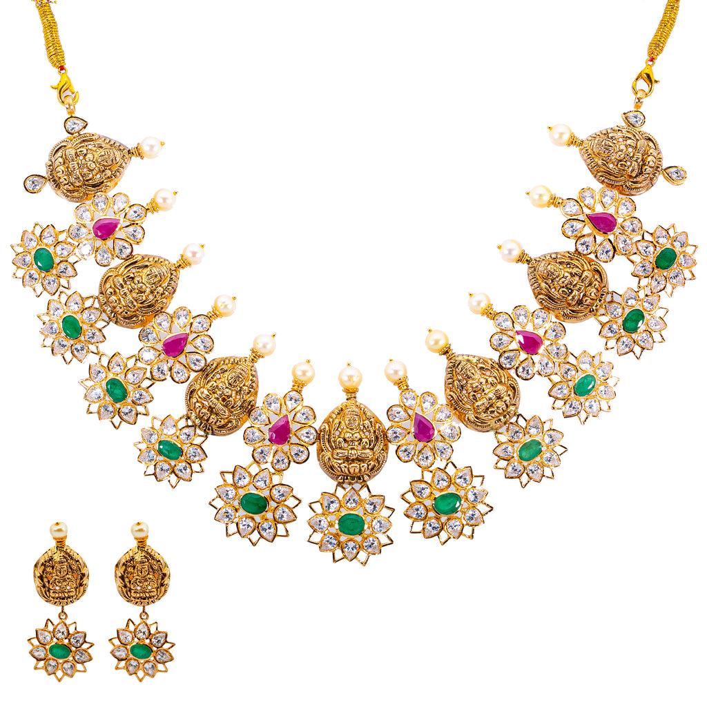 22K Yellow Gold, Gems & Pearls Laxmi Jewelry Set (79.6 grams) | 
Add a sophisticated layer of 22k gold and rich gemstones to your cultural or formal attire with ...