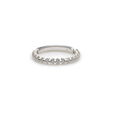 An image showing the diamond band of a 14K white gold wedding ring from Virani Jewelers. | On your wedding day, every piece of jewelry must be perfect, and nothing says perfection quite li...