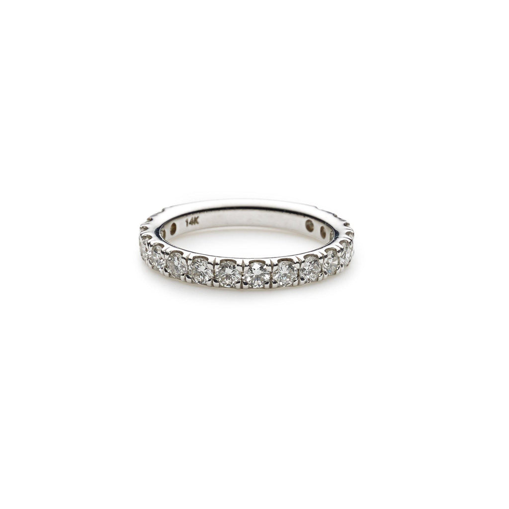 An image showing the diamonds in a 14K white gold wedding ring from Virani Jewelers. | Surprise your love with a beautiful white gold diamond wedding ring from Virani Jewelers.

Diamon...