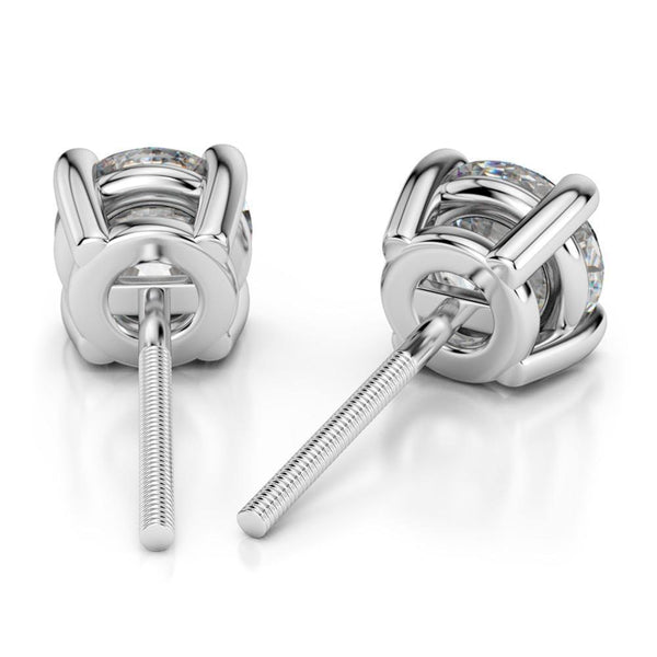 14k Yellow or White Gold Round Cut Diamond Solitaire Earrings (1-1/4 ct.) - Virani Jewelers | A beautiful pair of Solitaire Diamond Studs. Total weight of 1.25 ct.
Price given based on VS cla...