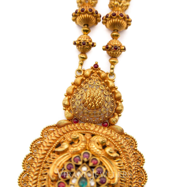 22K Antique Gold Finish Drop Necklace W/Kundans, Ruby, & Emerald Stones - Virani Jewelers | 22K Antique Gold Finish Drop Necklace W/Kundans, Ruby, & Emerald Stones for women. The Neckla...