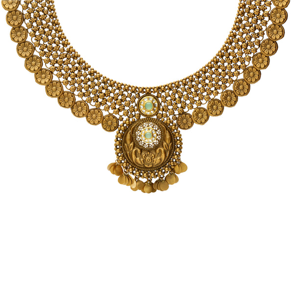 22K Yellow Gold Antique Necklace Set (74.6gm) | 


The floral details adorning the 22k gold necklace and jhumka earrings of this Indian gold jewe...