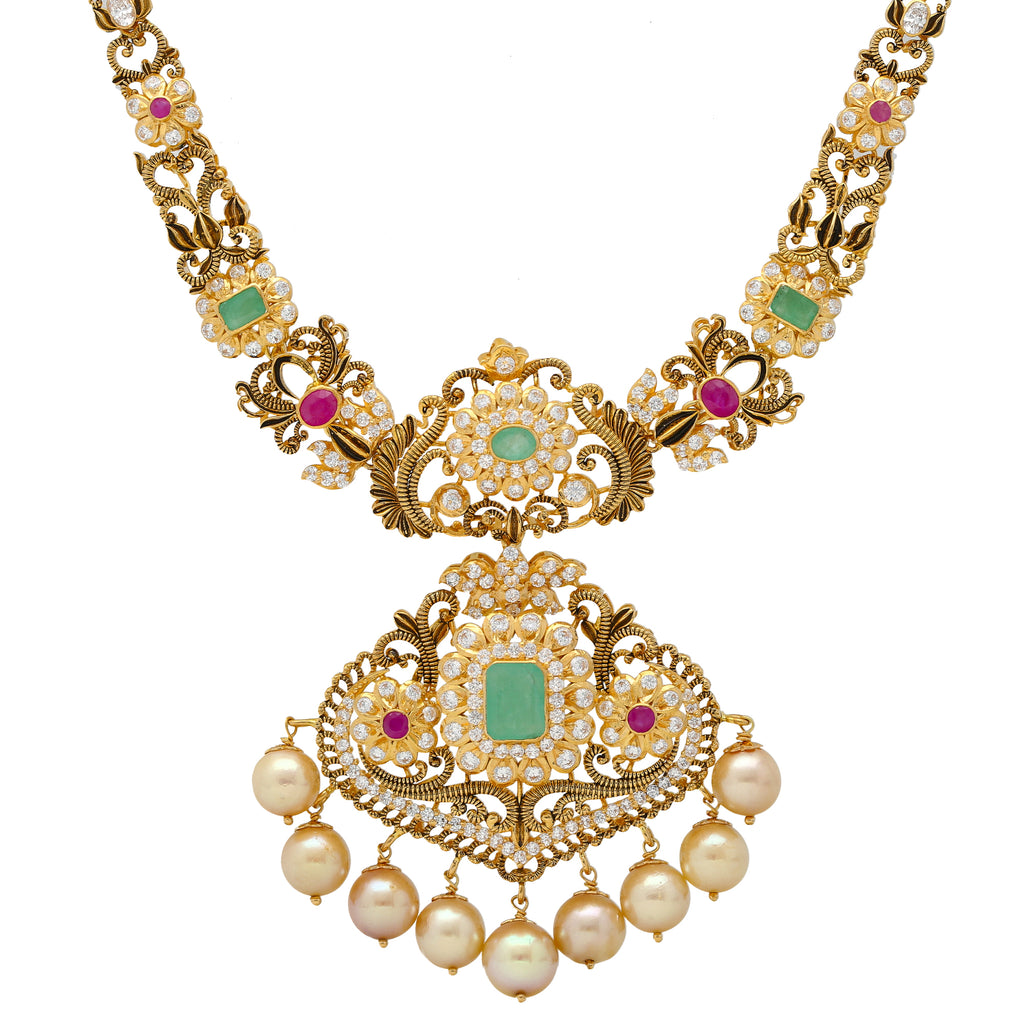 22K Yellow Gold, Emerald, Ruby, CZ, & Pearl Necklace(48.6gm) | 


The lush assortment of gemstones and pearls used along this dazzling 22k gold necklace beautif...