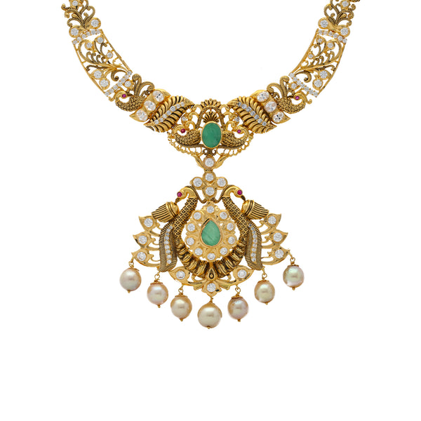 22K Yellow Gold, Gemstone, CZ, & Pearl Temple Necklace(51.1gm) | 


This intriguing 22k gold Indian necklace features a spectacular assortment of emeralds, cz sto...