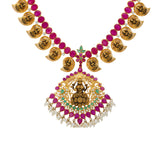 22K Yellow Gold, Gemstone, CZ, & Pearl Lakshmi Necklace(70.3gm) | 


The temple style design of this 22k gold necklace uses a vibrant assortment of gemstones to en...