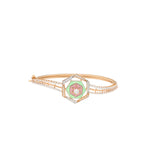 18K Rose Gold & CZ Bangle (12.2gm) | 


With its simple design and colorful accents, this 18k rose gold and cubic zirconia bangle has ...